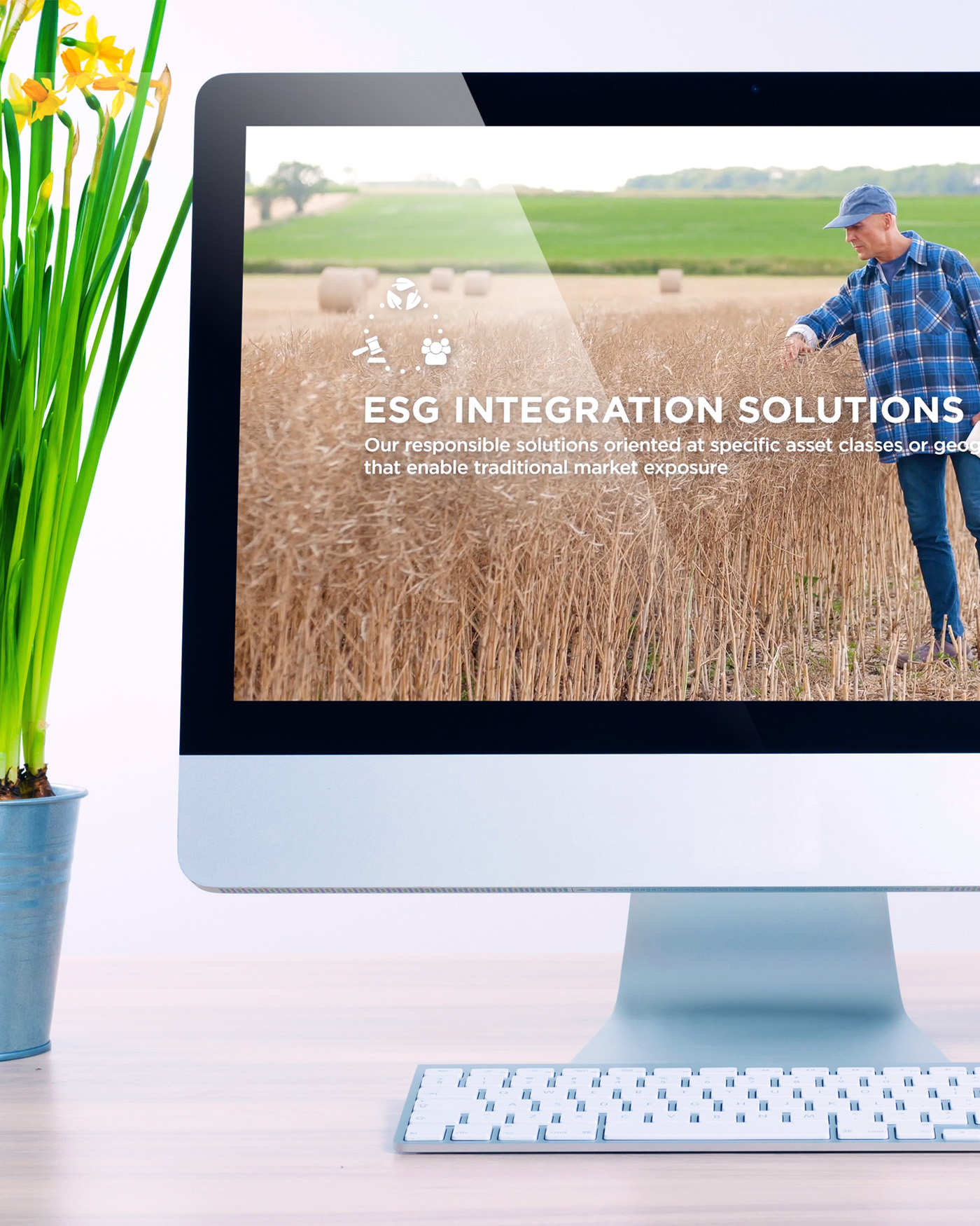 ESG Integration Solutions Amundi webpage displayed on a computer screen, featuring a farmer in a wheat field.